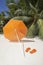 Orange sinshade at a tropical beach