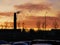 Orange skyline, dark factory pipe, Dolgoprudniy, Moscow, Russia
