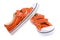 Orange sneakers isolated on white