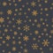 Orange snowflakes pattern on grey Christmas.