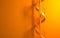 Orange spiral staircase on the orange wall
