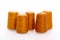 Orange spool of thread isolated on white background. Skein of woolen threads. Yarn for knitting. Materials for sewing