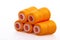 Orange spool of thread isolated on white background. Skein of woolen threads. Yarn for knitting. Materials for sewing