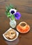 Orange spotty mug and cookies