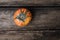 Orange squash pumpkin placed on rustic wooden boards