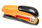 Orange Stapler on white background. Close up