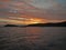 Orange stratocumulus cloudy island Sunrise Seascape. Australia