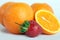 Orange, strawberries on white background.