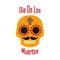 Orange sugar skull on white background. Dia de los Muertos