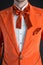 Orange suit orange bow tie