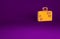 Orange Suitcase for travel icon isolated on purple background. Traveling baggage sign. Travel luggage icon. Minimalism