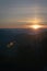 Orange sun rising over the clouds on a morning sunrise landscape