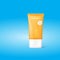 Orange sun screen tube mockup for cosmetics with cap