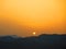 Orange sunrise over Andalusian hills