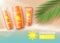 Orange sunscreen bottles on tropical beach - ad poster mockup