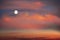 Orange sunset  dramatic cloudy sky night starry sky moon universe cosmic dramatic clouds