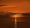 Orange sunset over loop head in clare