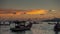 Orange sunset sky tourist boat beach port 4k time lapse thailand