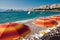 Orange sunshades and deck chairs on Baska beach - Krk Croatia