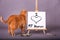 Orange tabby cat standing by sign with I love my human painted on canvas