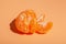 Orange tangerine isolated on orange background