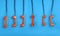 Orange telephones over blue background