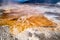 Orange thermal pools at Upper Terrace of Mammoth Hot Springs