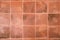 Orange tiles floor background, orange tile architecture wallpaper and background.