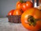 Orange tomatoes in a wicket basket