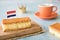 Orange tompouce, traditional Dutch treat with pudding and frosting on national holiday Kings Day April 27th, in The Netherlands.