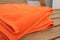 Orange towel lay on the wood c