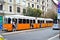 Orange tram at Hungary, city Budapest, photo