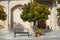 Orange tree and bench in picturesque village Laneia Lania, Cyp