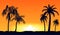 Orange tropical sunset silhouettes of palm trees. Tropical beach on background yellow setting sun.