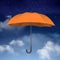 Orange Umbrella on sky with clouds background