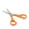 Orange used scissors isolated on white