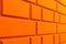 Orange wall with classic rustication pattern