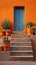 orange walls with doors and stairs in a light emerald and indigo style blend Mexican and American cultures