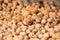 Orange walnuts close up background