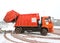 Orange waste collection truck