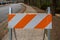 Orange and White Alert Strips on Construction Sign