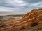 Orange and white rock layers, with vivid colors