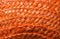 Orange wicker woven texture as background