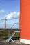 orange wind turbines on the dutch island of flevoland near Almere