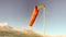 Orange windsock blowing in the wind