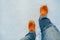 Orange winter shoes in snow