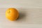 Orange on the wooden floor. Fresh Orange on the wooden table