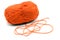 Orange wool ball on white isolated background.