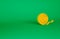 Orange Yarn ball icon isolated on green background. Label for hand made, knitting or tailor shop. Minimalism concept. 3d