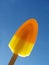 Orange and yellow ice lolly